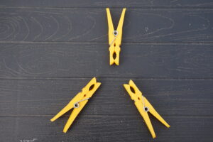 Yellow clothes pegs