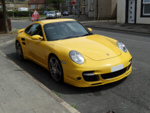 Yellow Porsche car